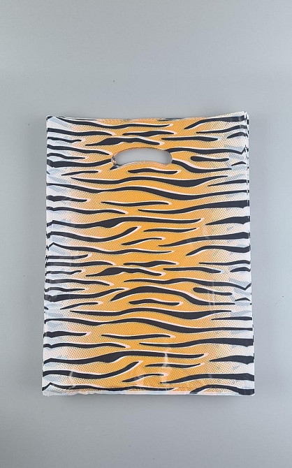 Пакети з вирубаною ручкою (28*40) "ТИГР" Комсерв (100 шт.) Харків - фото 2