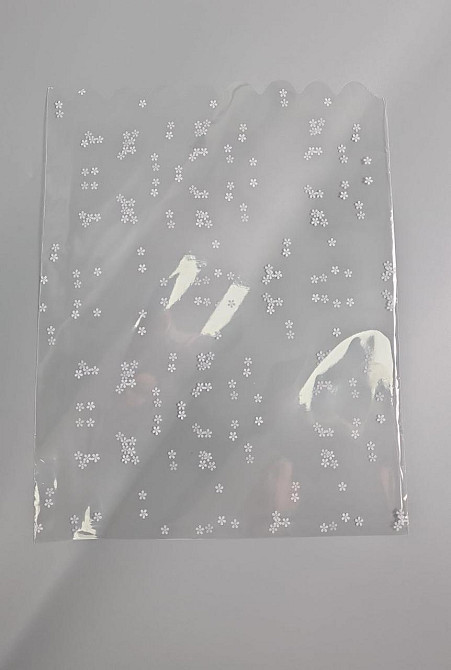 Пакет із малюнком для пакування подарунків (30*40) No391(2) (ажурний) "Ромашки" (100 шт.) Харків - фото 1