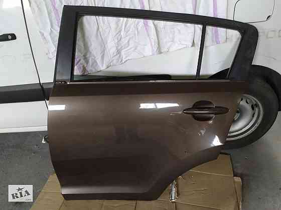 Двері Kia Sportage Киев