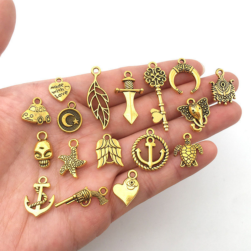 Набір золотих підвісок "Тварини" 50 шт для прикрас Київ - фото 3