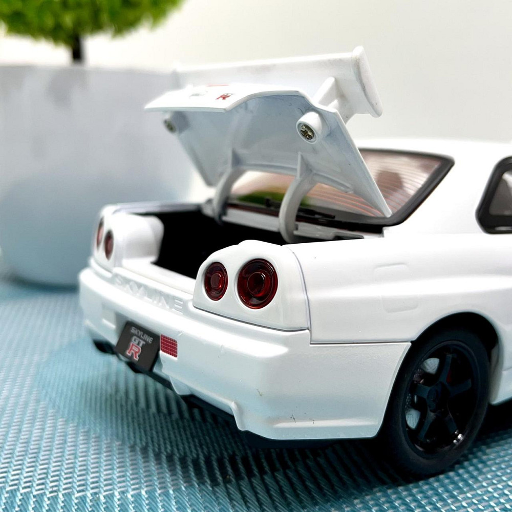 Машинка металева Авто Експерт Nissan GT-R 1:24 світло/звук відчиняються двері капот багажник Біла (1990-21) Чернигов - изображение 5