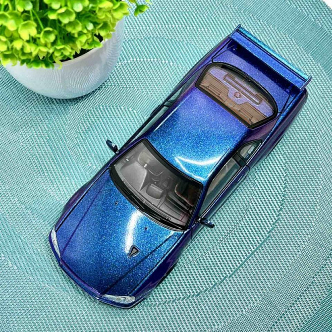 Машинка металева Авто Експерт Nissan GT-R 1:24 світло/звук відчиняються двері капот багажник Фіолетова (1990-21) Чернігів - фото 5