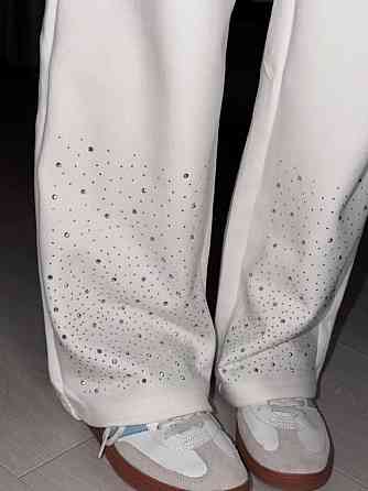 Стильний жіночий повсякденний костюм зі стразами вільного крою тринитка Молочний, 46/48 Одеса