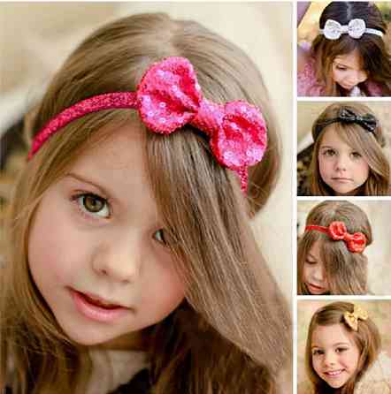 Дитяча срібляста пов'язка з паєтками - бант 9*5 см, окружність 38-50см Київ