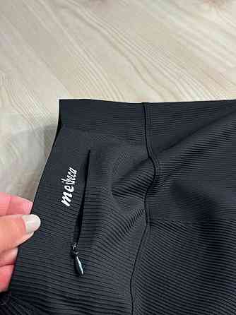 Шорты женские Kenalin 500-9 велосипедки в рубчик с карманом и надписью сзади черные, черный, L Киев