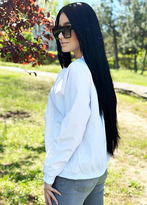 Жіноча вітровка з щільної плащівки "Leland" оптом | Розпродаж моделі Білий, 42-44 Київ - фото 2