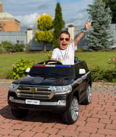 Детский электромобиль Полицейский внедорожник (MP3, USB, качание, музыка, пульт, открывание дверцы, LED-свет) Киев