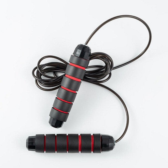 Скакалка швидкісна PowerPlay 4210 Power Weighted Jump Rope Чорна (2,7m.) Каменское - изображение 5