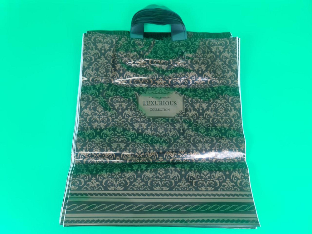 Пакет із петльовою ручкою середній щільний ламінований "Люксоріус 047" (40х45+3) 95 мк КВС (50 шт) Харків - фото 1