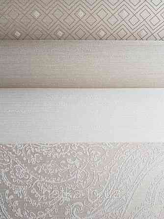 Текстильні шпалери на флізеліновій основі Cador Rasch Textil 086750 вензелі бежево-рожеві Київ