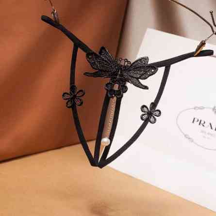 Трусики з розрізом, квіточками, метеликами чорні - розмір універсальний (на резинці), 15% нейлон, 85% поліестер Київ