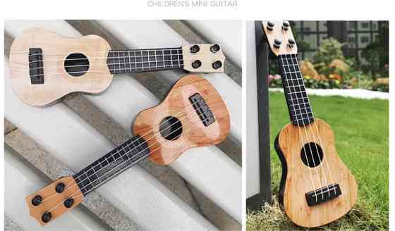 Гітара дитяча іграшка, бежева, дитяча укулеле, довжина - 25см, ширина 9см, пластик, 4 струни, унісекс, 3+ Київ
