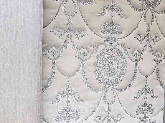 Шпалери вінілові на флізеліні Rasch Trianon Xlll 0.53х10 класика структурні вензелю розетки срібло на бежевому Київ