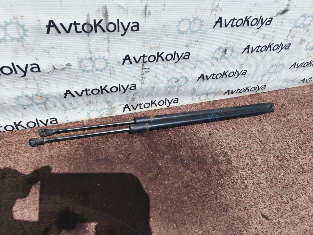 Амортизатор кришки багажника Nissan Note E11 2005-2012 (904509U00C) Ковель - фото 1