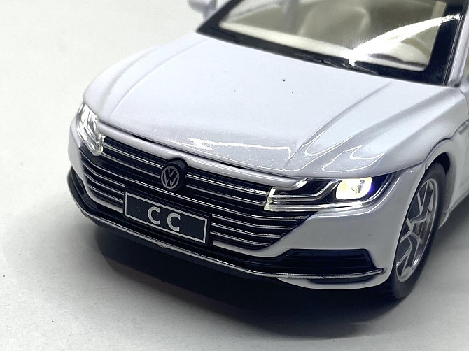 Машинка металева Volkswagen Passat SS 1:32 світло звук Біла (GT-01200) Чернігів - фото 6