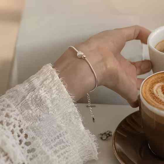 Женский браслет с серебристой подвеской-сердцем – минималистичный браслет из нержавеющей стали Киев