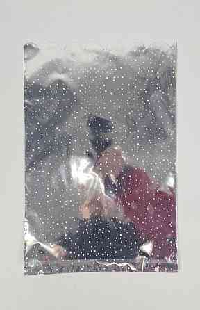 Пакет із малюнком для пакування подарунків (25*40) No427 (9) фольгований (ажурний) "Капелька" (100 шт.) Харків