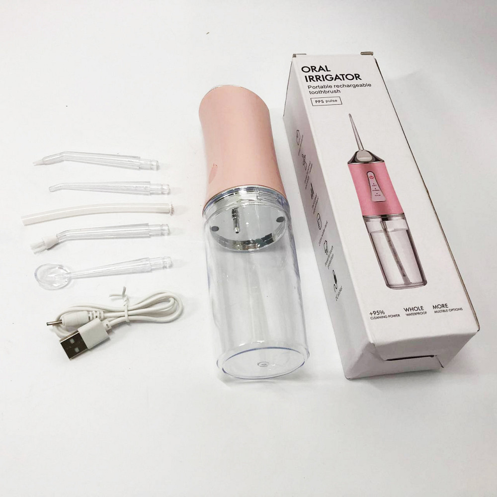 Іригатор для чищення зубів та порожнини рота Oral Irrigator з акумулятором та змінними насадками. Колір: рожевий MK-36 Львів - фото 7