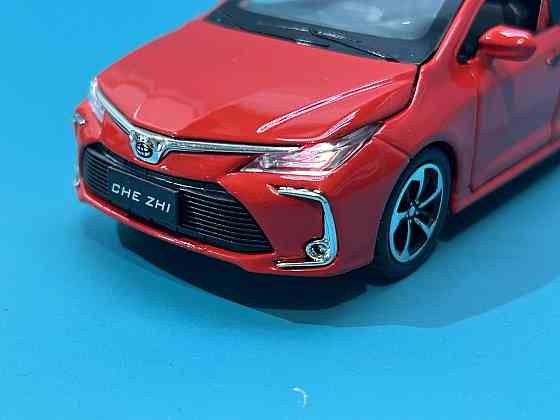 Машинка металева Авто Експерт Toyota Corolla 1:32 метал світло/звук Червона (GT-6258) Чернігів