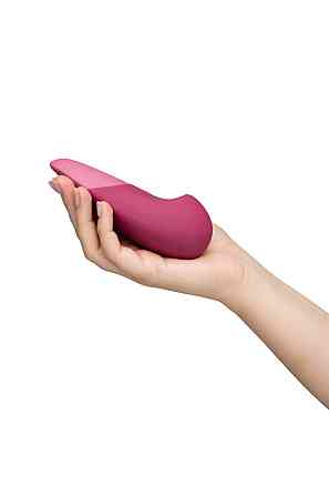 Вибратор универсальный бесшумный Womanizer Vibe Dusky, розовый Sex Aura Киев