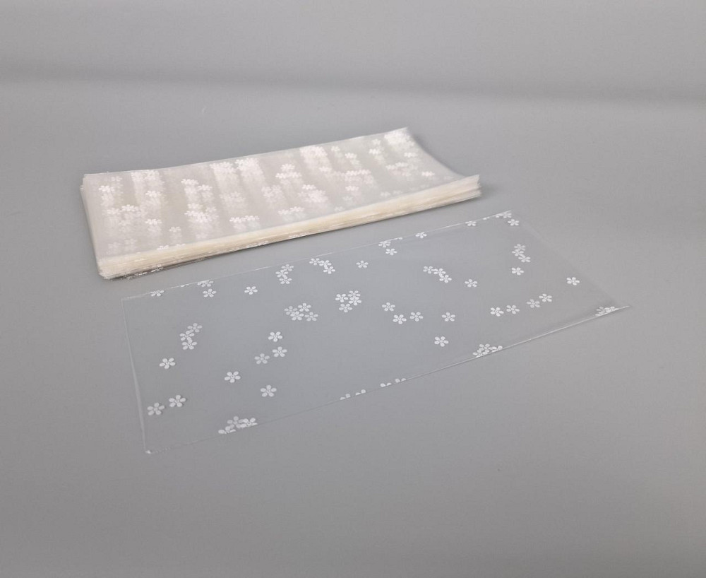 Пакет із малюнком для пакування подарунків (10*25) No09027 (3) "Ромашки" (100 шт.) Харків - фото 2