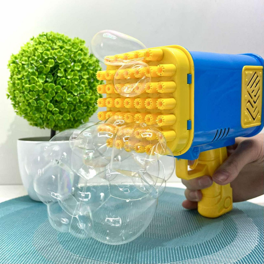 Пістолет для запуску мильних бульбашок 45 отворів 17 см Жовто-синій (2023-58A) Чернігів - фото 1