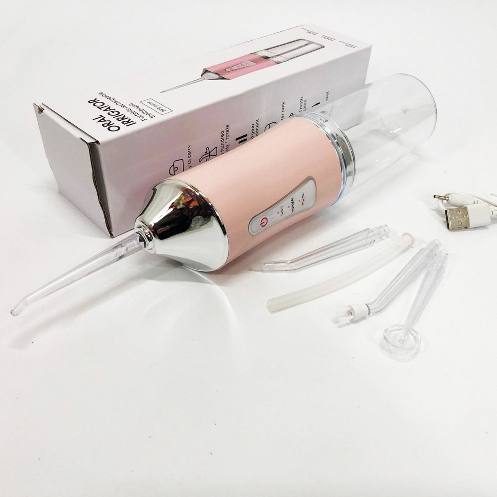 Іригатор для чищення зубів та порожнини рота Oral Irrigator з акумулятором та змінними насадками. Колір: рожевий MK-36 Львів - фото 4