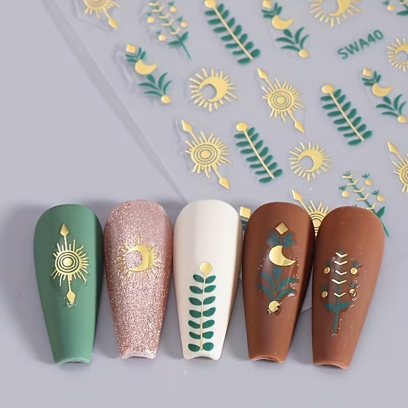 Набор наклеек для ногтей 2 листа — золотые элементы, солнце, луна, растения Киев - изображение 1