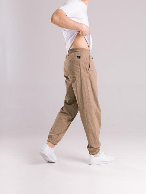 Чоловічі штани джогери з плащівки бежеві з кишенями Pobedov Ground Київ - фото 7