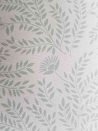 Шпалери флізелінові дитячі еко Lutece Tartine et Chocolat листя гілочки квіти смарагдові на білому Київ