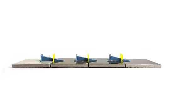 Система вирівнювання плитки MINI Клин 9*70мм (100 шт) Харків