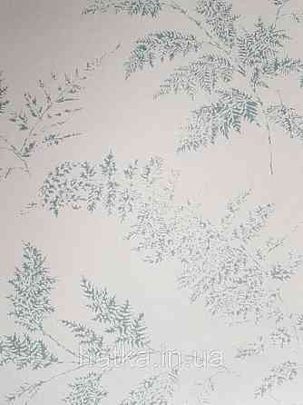 Шпалери флізелінові дитячі еко Lutece Tartine et Chocolat ніжні великі гілки листя бірюзові на білому Київ