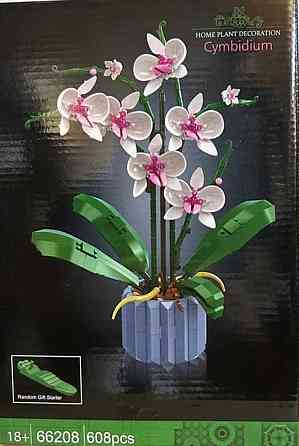Конструктор напоминает LEGO Icons Botanical Орхидея из 608 деталей. Киев
