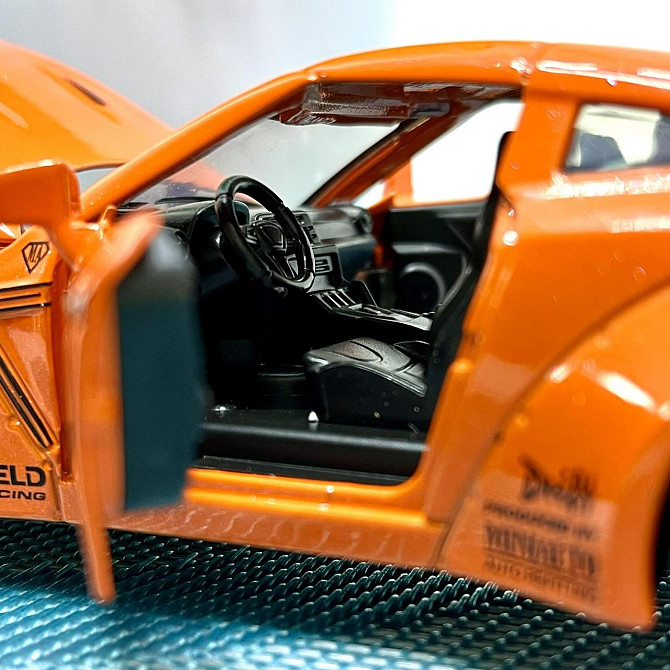 Машинка Auto Expert Nissan GTR металева 1:32 світло/звук/інерційна Жовтогаряча (38071) Чернігів - фото 7