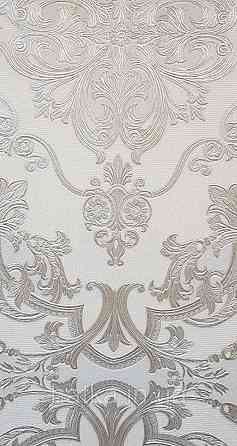 Обои виниловые на флизелине AdaWall Seyyah 1.06х10 вензеля цветы фигуры структурные серебристые на белом Киев