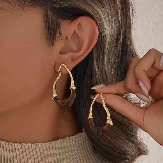 Сережки пара сережки-кільця золотисті зігнутої форми жіноча біжутерія сережки комплект мідний сплав Кам'янець-Подільський