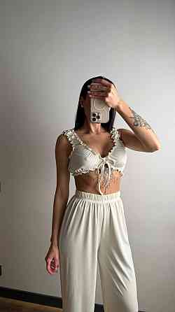 Жіноча піжама-двійка: топ і штани з романтичними рюшами рубчик Молочний Одеса