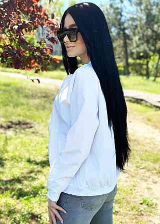 Жіноча вітровка з щільної плащівки "Leland" оптом | Розпродаж моделі Білий, 46-48 Київ