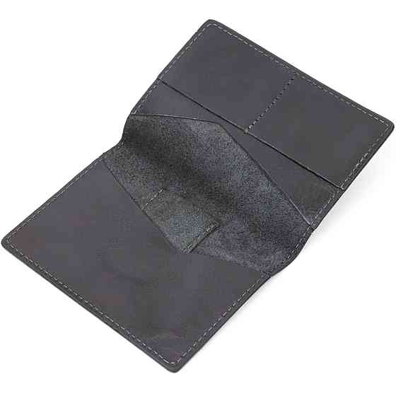 Сучасна шкіряна обкладинка на паспорт з утримувачем для Apple AirTag GRANDE PELLE 11622 Чорний Київ