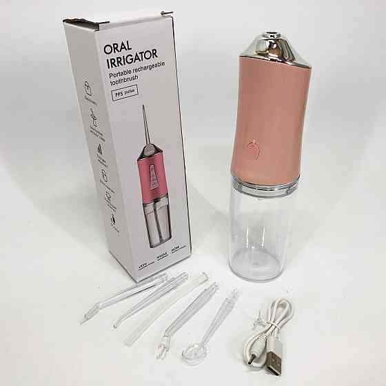 Ирригатор для чистки зубов и полости рта Oral Irrigator с аккумулятором и сменными насадками. Цвет: розовый UZ-30 Львов