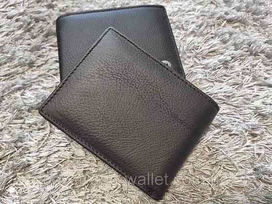 Зручне чоловіче портмоне без застібки коричневого кольору ST Leather Київ