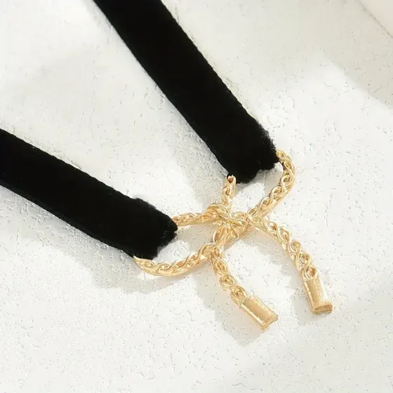 Женский черный бархатный чокер с золотистым бантом Киев