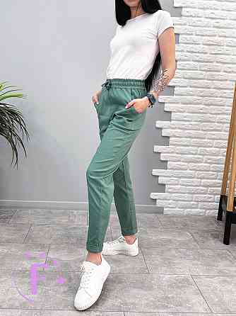 Вкорочені штани з кишенями "Street" оптом | Норма Фісташковий, 42 Київ