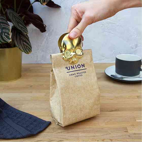 Біндер у формі черепа, золотий Ровно