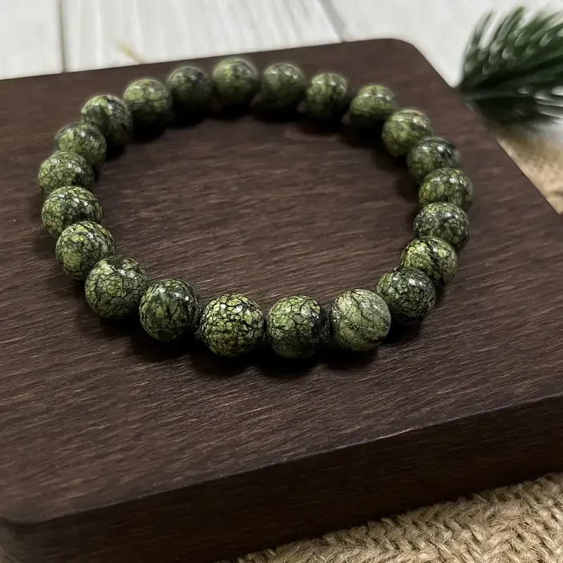Браслет змеевик (серпентин) — натуральный камень, бусины 8 мм, на резинке, длина 19 см, зелёный, унисекс Киев - изображение 2