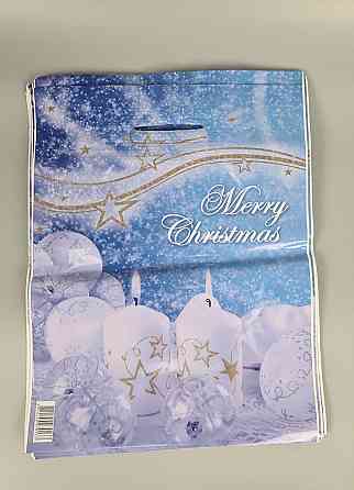 Пакети з вирубаною ручкою ламінат Н.Год "Дві свічки" (30х40) Ренпако (50 шт.) Харків