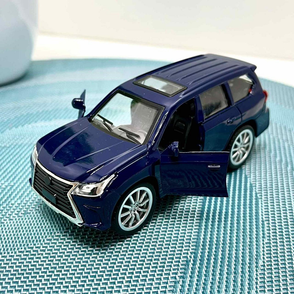 Автовоз Mercedes Actros з машинками світлові та звукові ефекти масштаб 1:24 Червоний (53522-46) Чернігів - фото 7