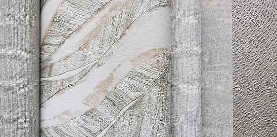 Шпалери вінілові на флізеліновій основі Rasch Ascona 1.06х10 метрове листя структурне зелене із золотистим Київ