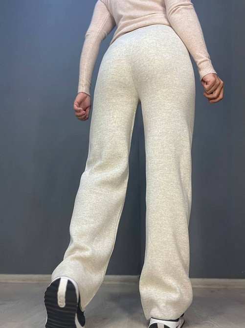 Брюки женские My fashion 202401 клеш от бедра со стрелкой шнурок га талии машинная вязка one size, світло-бежевый, one size Киев - изображение 8