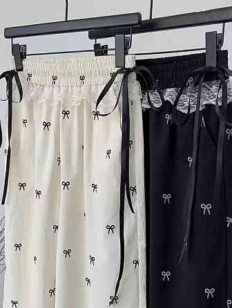 Женские стильные оверсайз брюки карго с бантиками отделаны кружевом плащевка Одесса